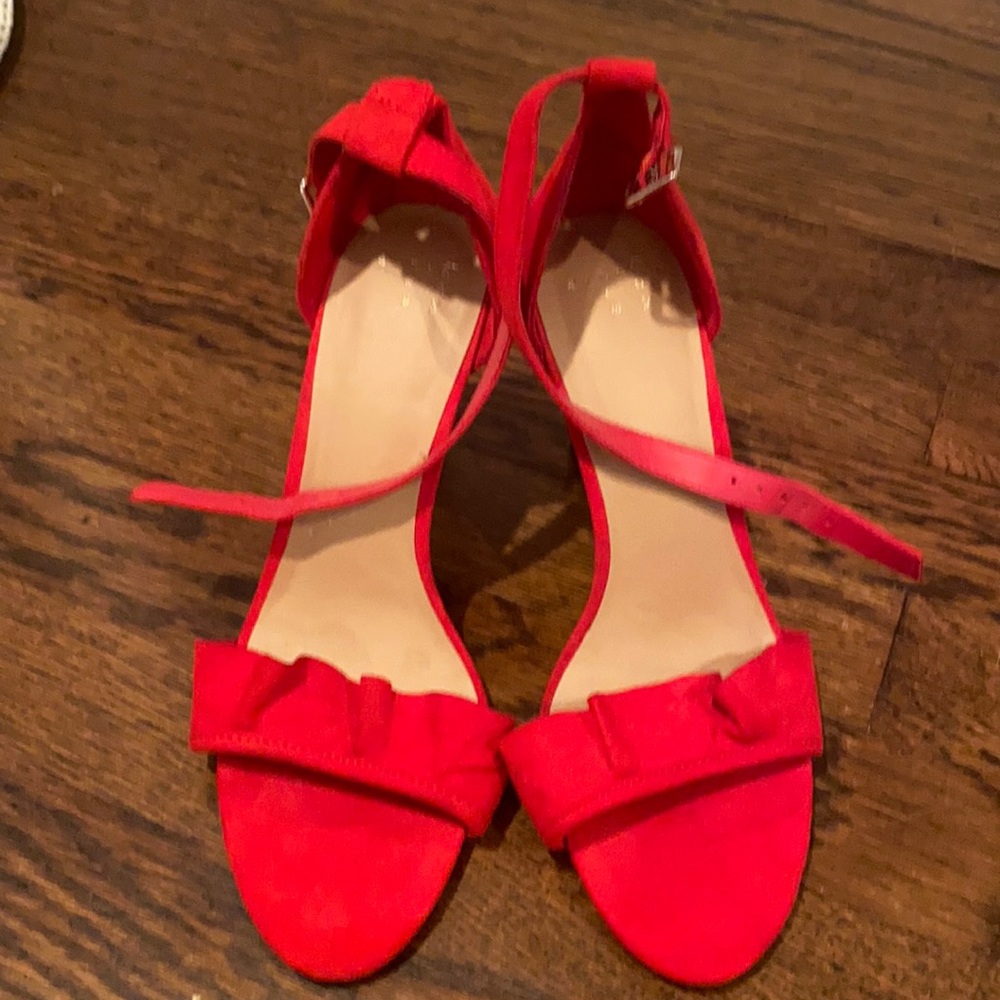 Red woman high heel shoe.  Wraps around ankle - opens toe